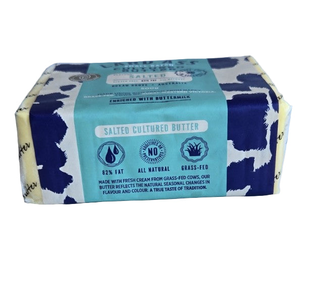 Bar of butter with a blue label on a white background